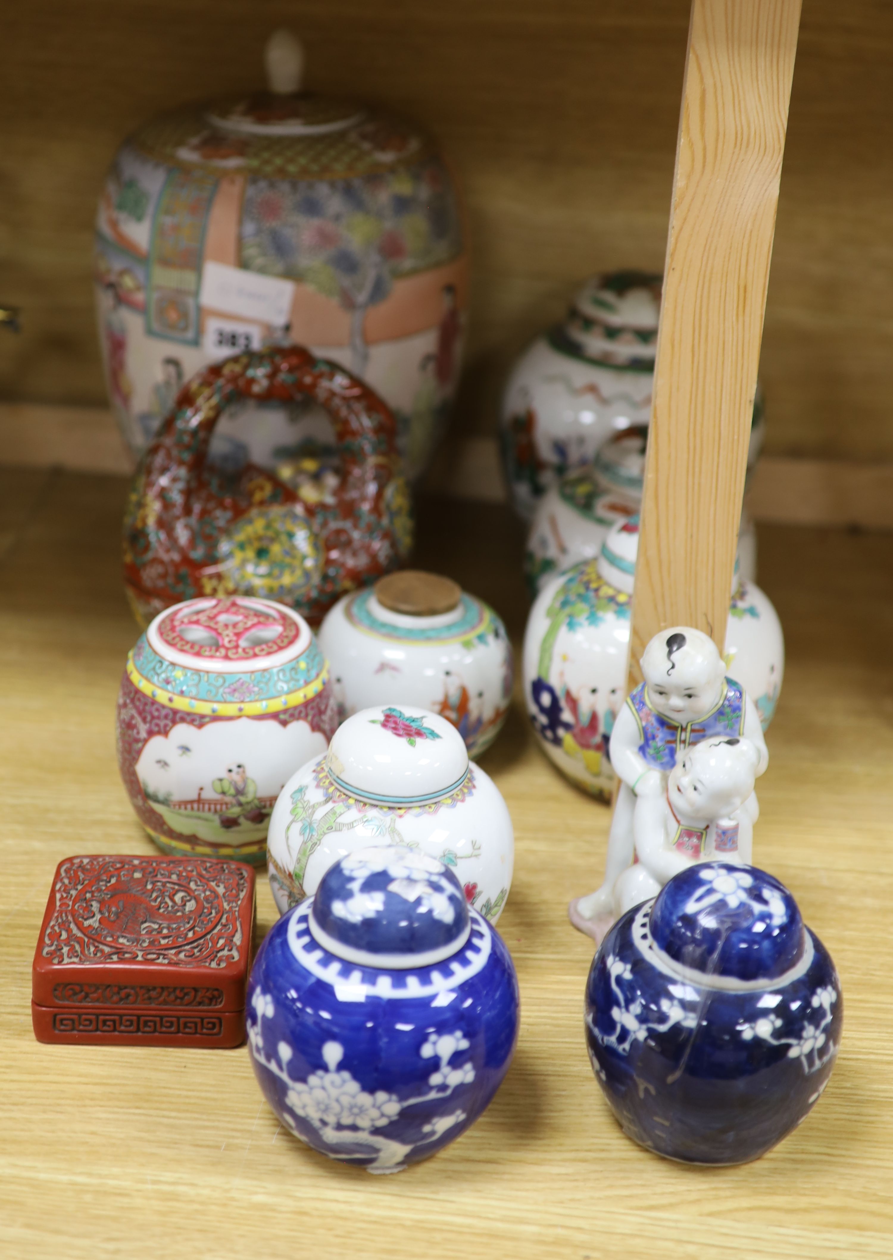 A Chinese vase, six Chinese jars and covers, a box as a basket, a jar and figure, tallest 30cm (11)